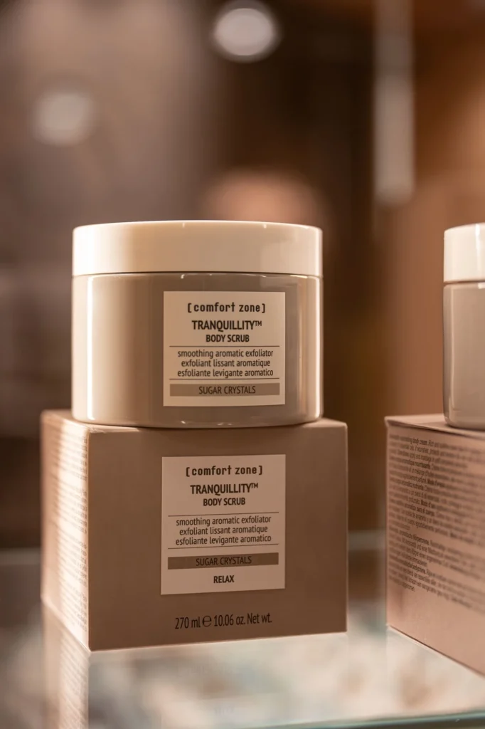 A jar of Comfort Zone Tranquillity Body Scrub on a box.