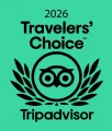 "Logo del premio Travelers' Choice 2026 di Tripadvisor con simbolo gufo e foglie."